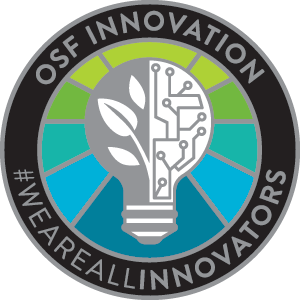 Circular emblem with a lightbulb in the middle. Half the lightbulb is a growing plant and the other other is circuitry.
